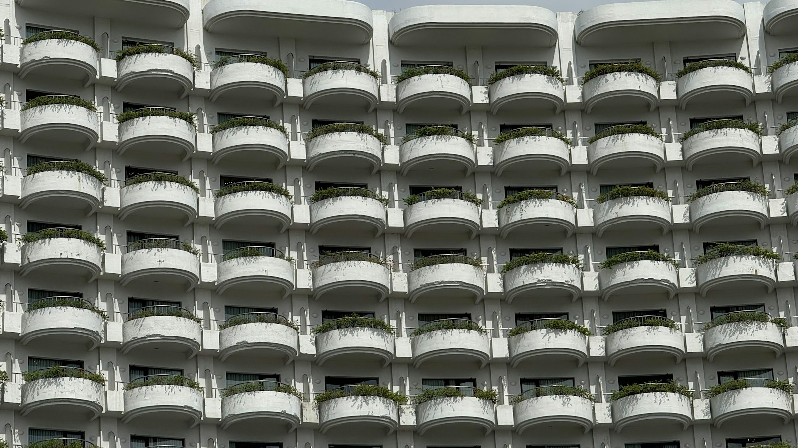 Rows of identical hotel balconies