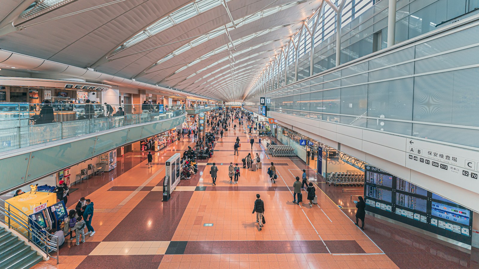 Travellers in a modern airport terminal